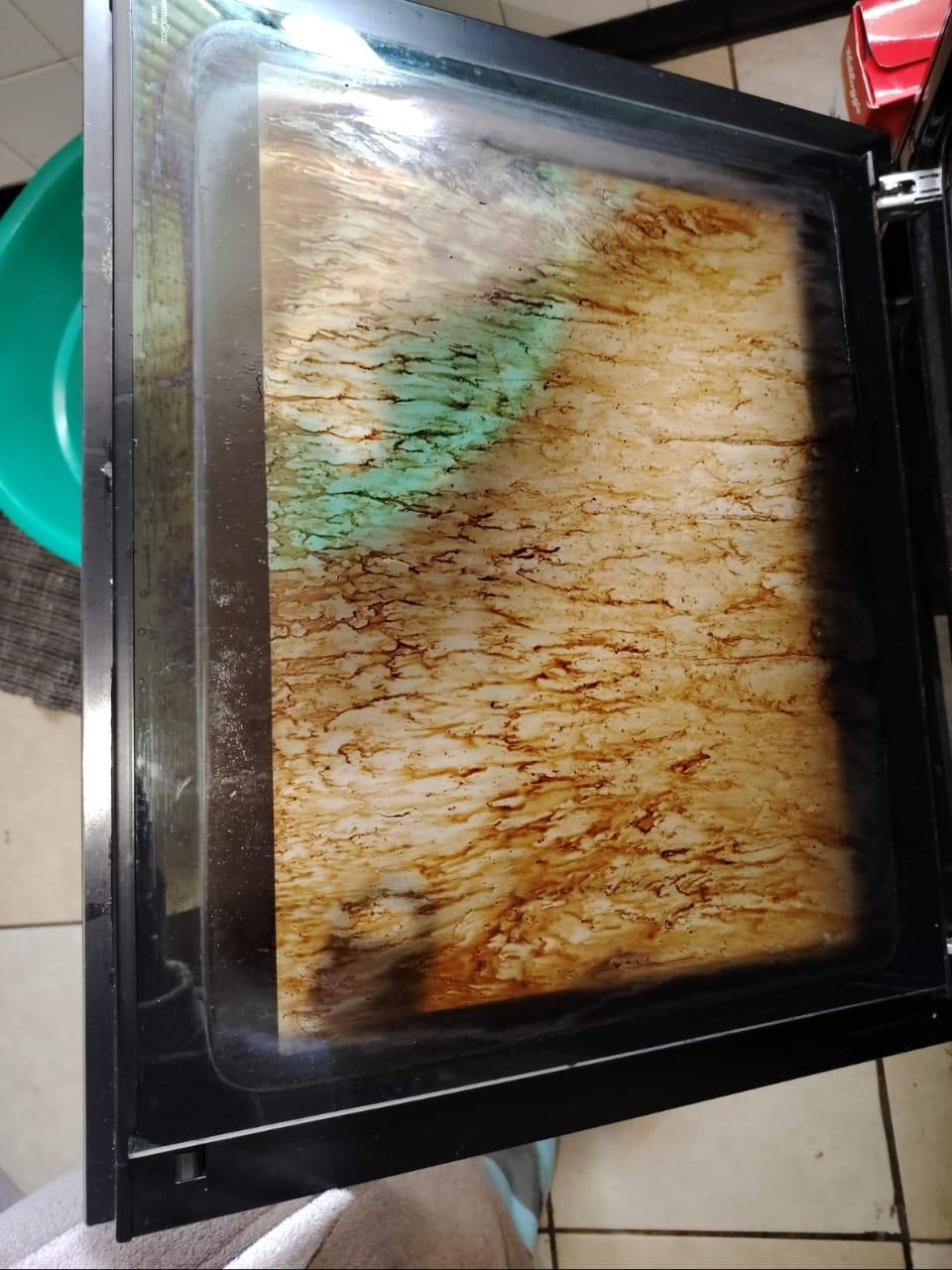Oven Door before cleaning